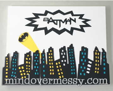 Cute by day, Light by Night! A great way to add a city scape to your super heroes walls if you do not want to stencil. A "how to" for battery operated LED lights included. 